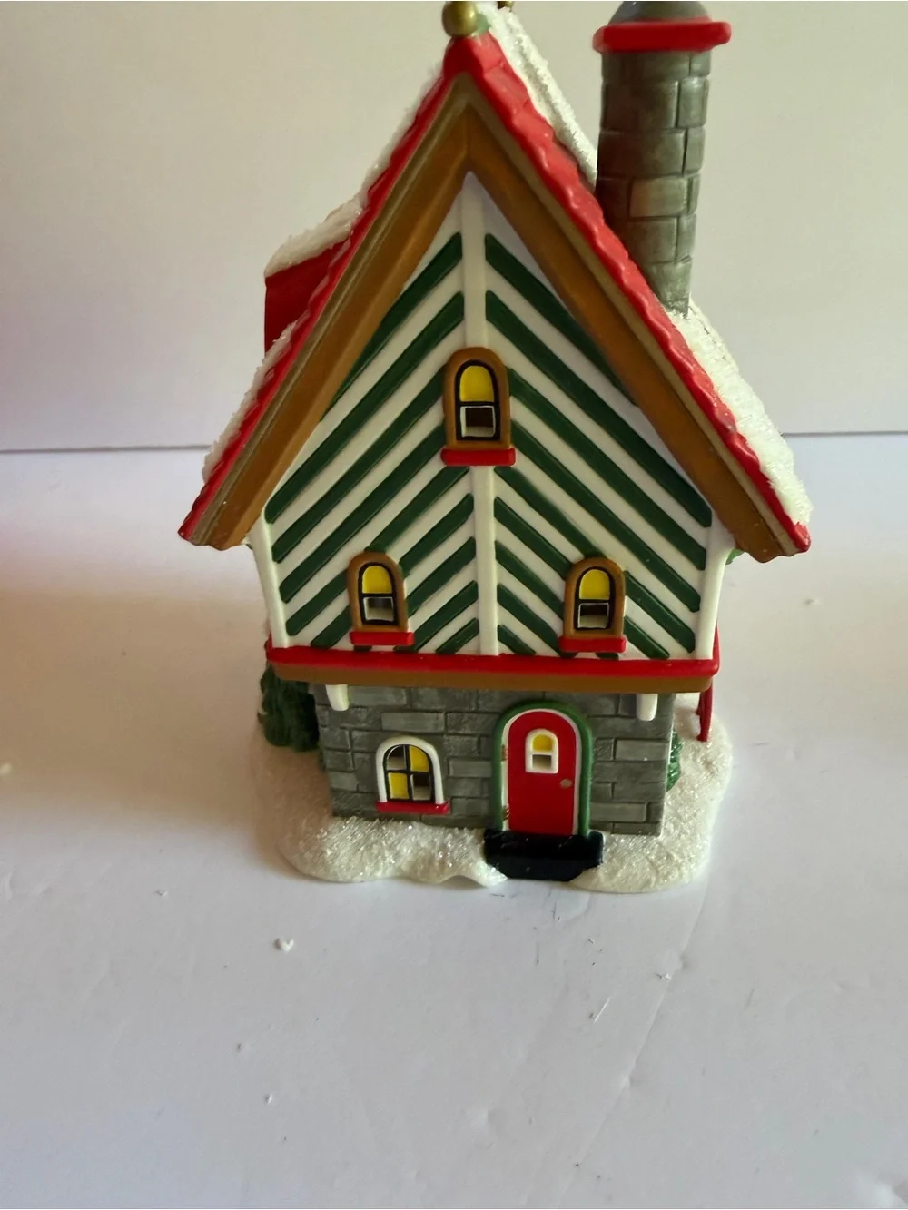 Department 56 Rudolph Hermey's Elf Dormitory - Red, Green, White, Gold